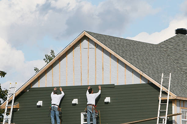 Professional Emergency Siding Repair technician working in Aberdeen, OH